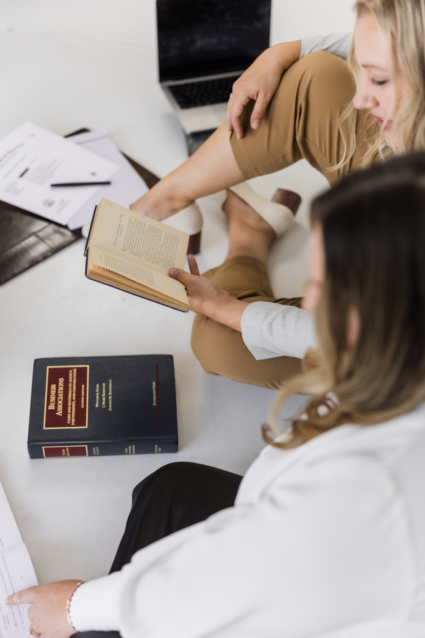 Attorneys looking at lawbooks
